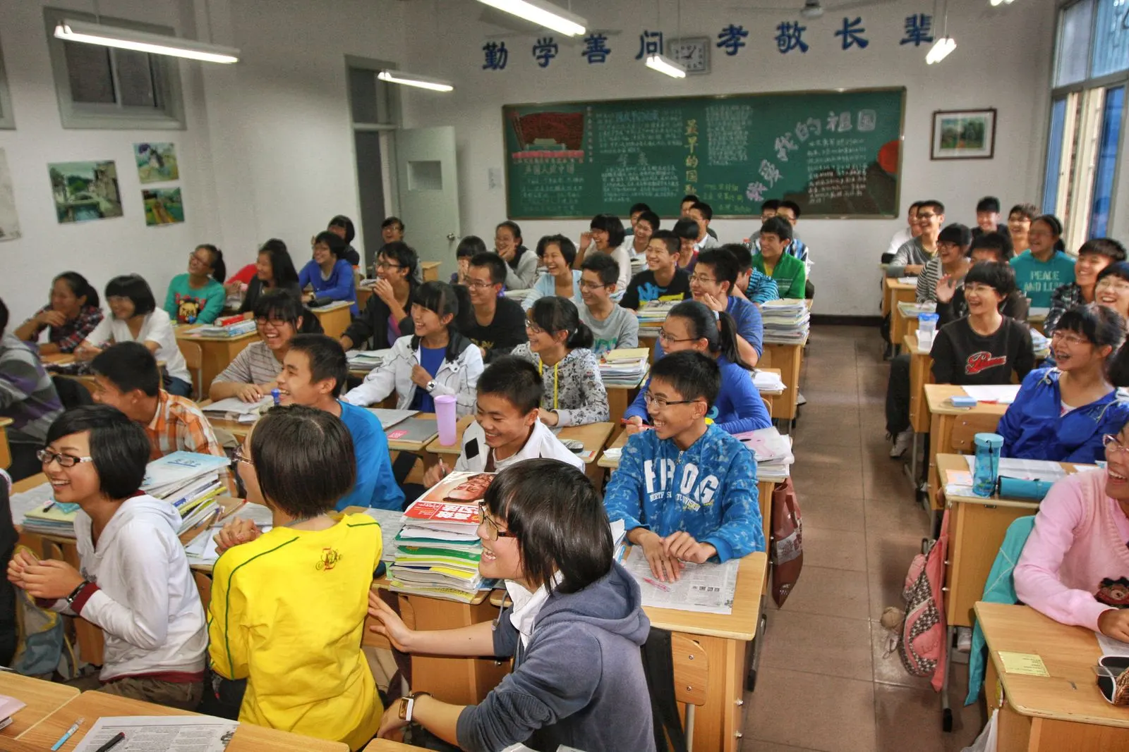 Students in a busy classroom in China